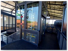 Glass passenger stretcher lift